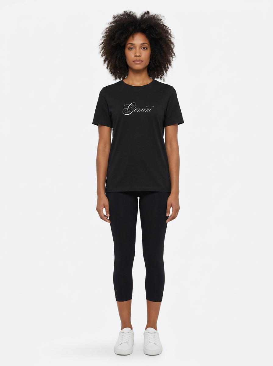Model in the Gemini Black Top with black capris