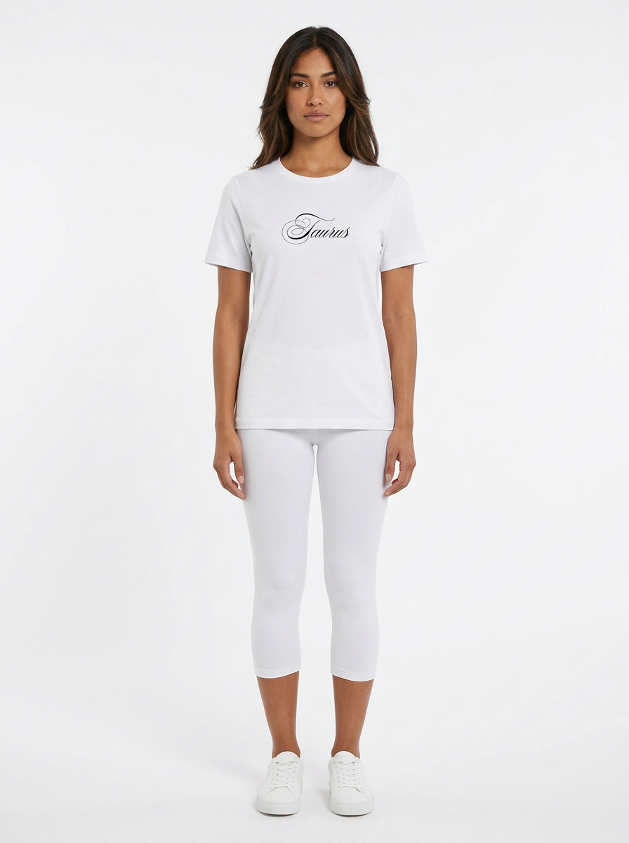 Model in the Taurus White Top with white capris