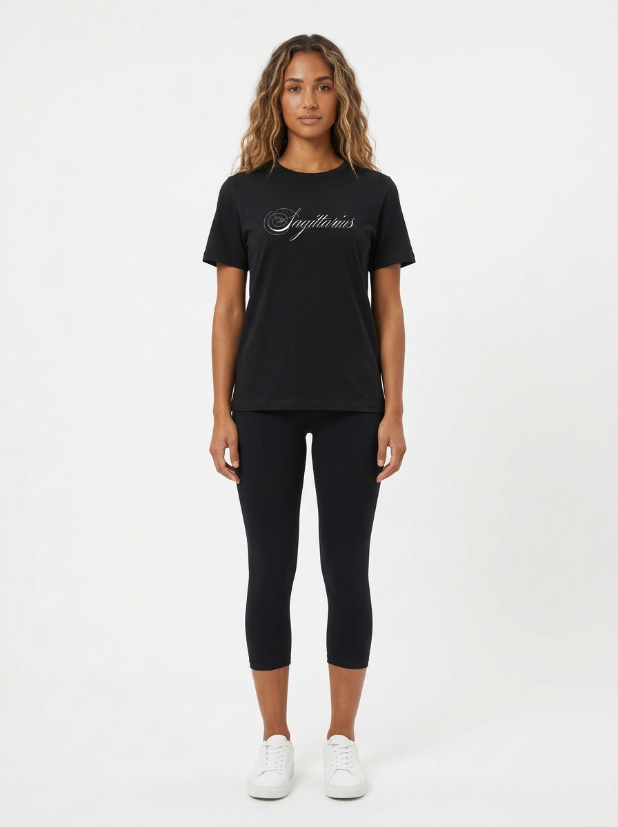 Model in the Sagittarius Black Top with black capris