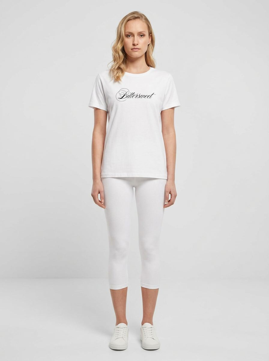 Model in the Bittersweet White Top with white capris