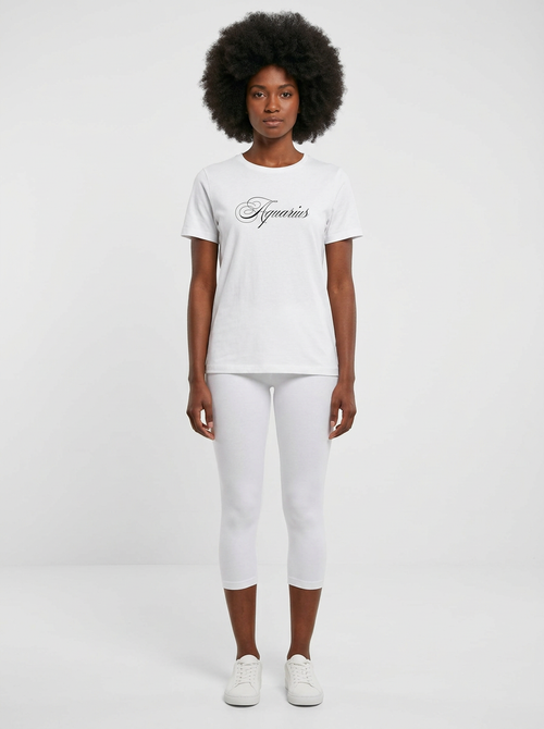 Model in the Aquarius White Top with white capris