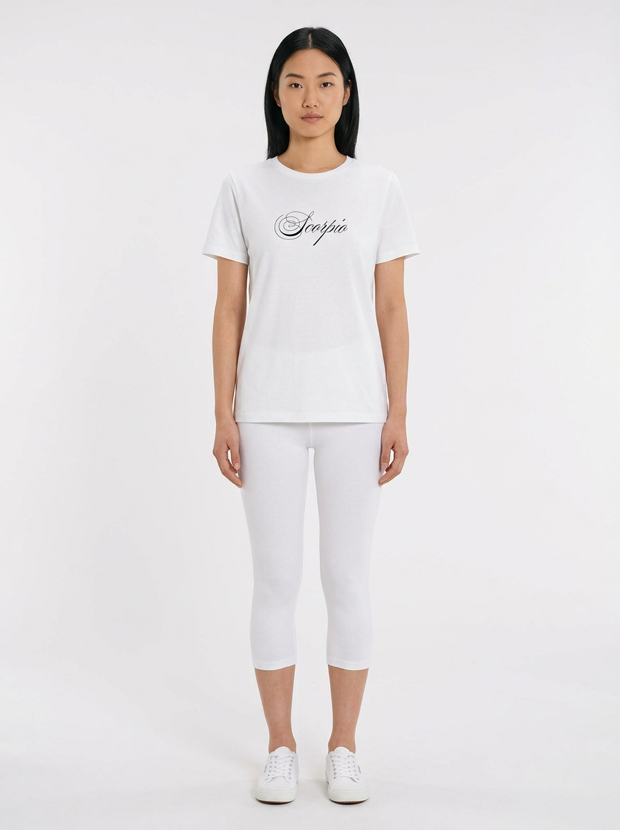 Model in the Scorpio White Top with white capris